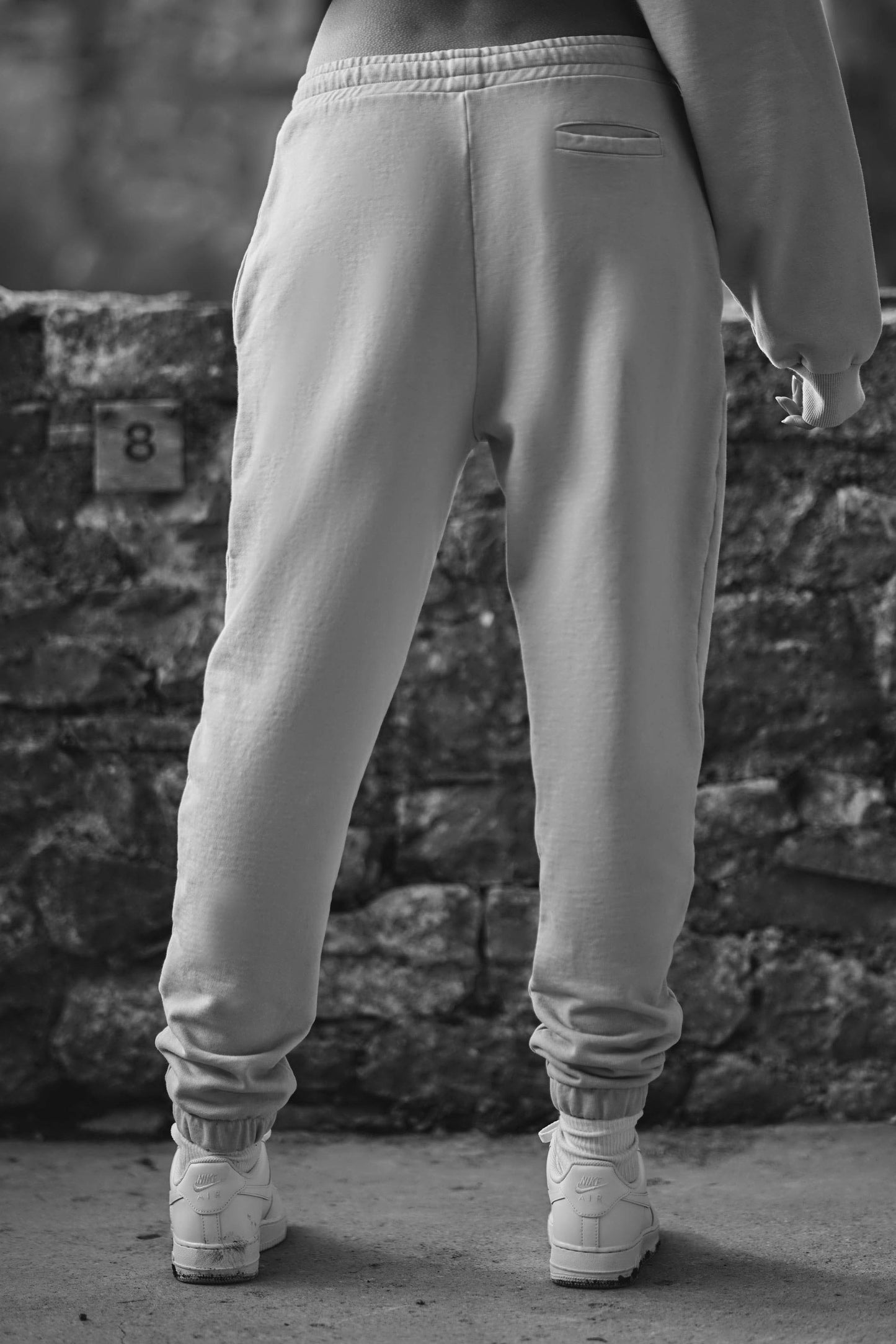 back view of womens luxury blue joggers