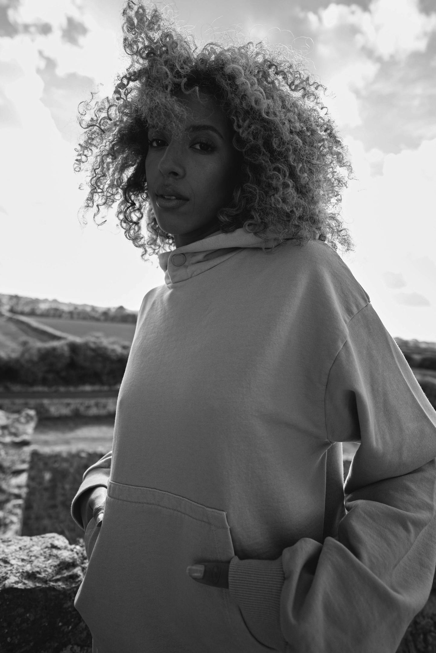 black and white image of womens oversized luxury hoodie in blue