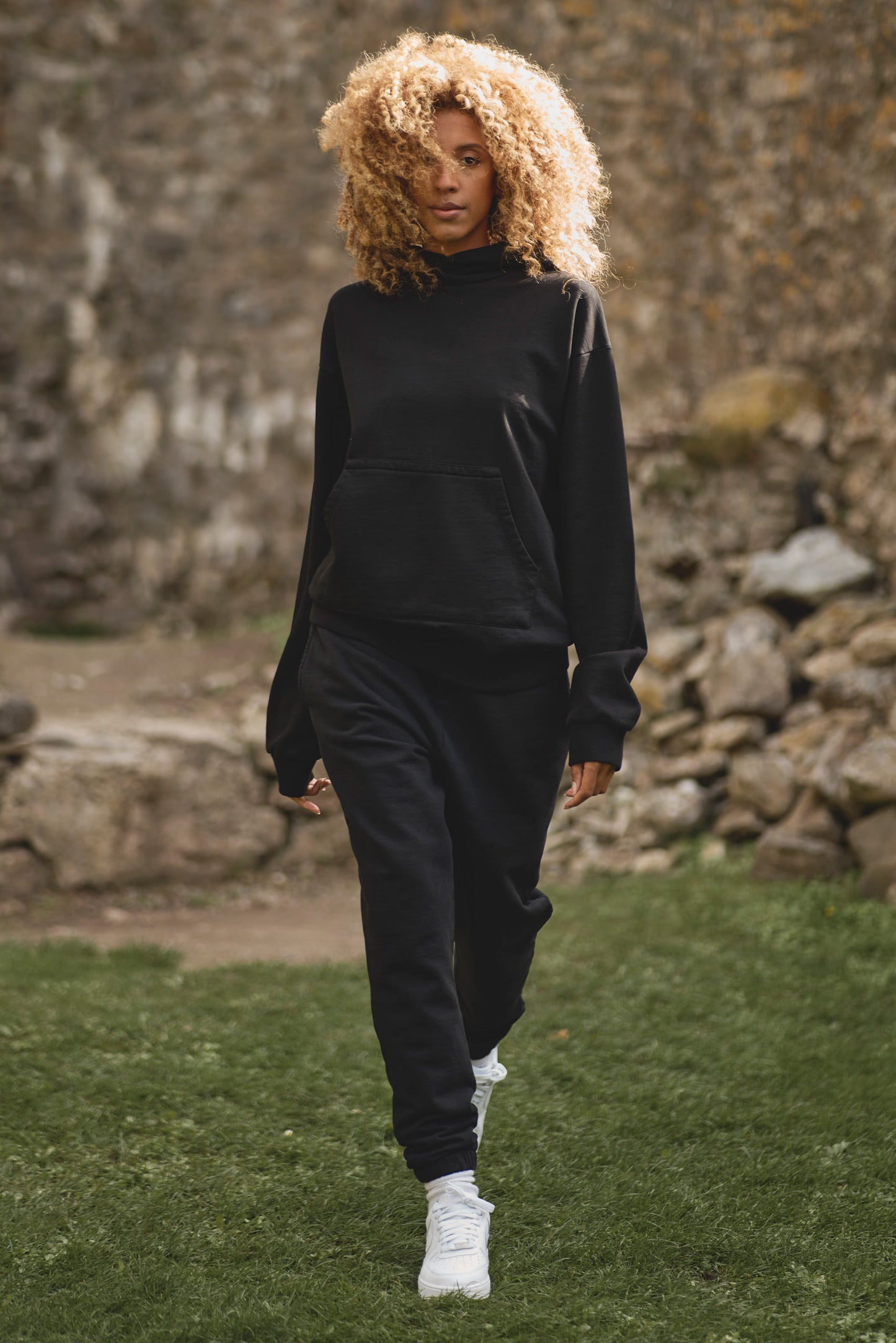 full view of womens luxury tracksuit in black