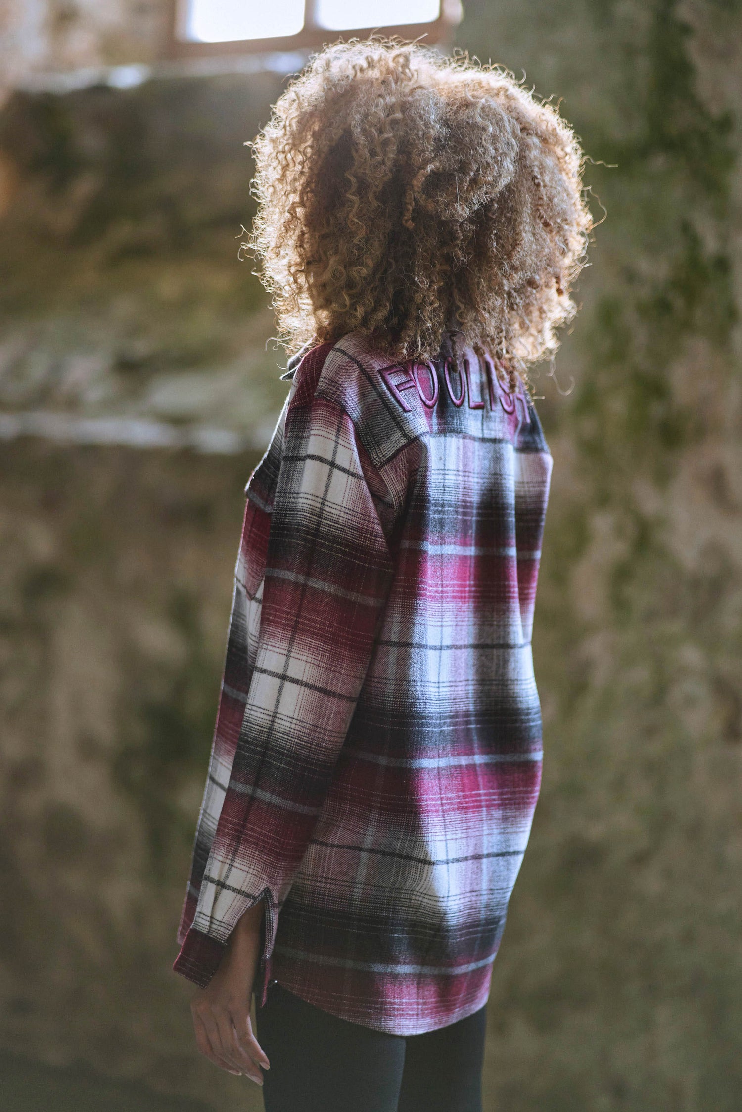 side view of model wearing luxury womens check shirt