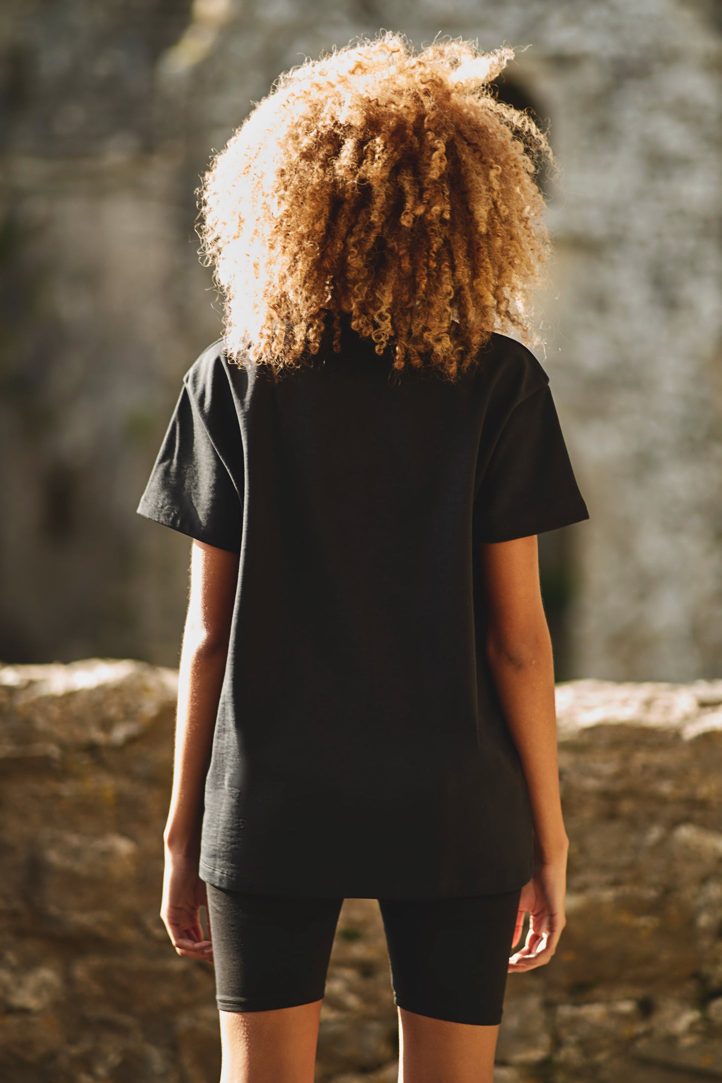 back view of womens oversized t-shirt in black