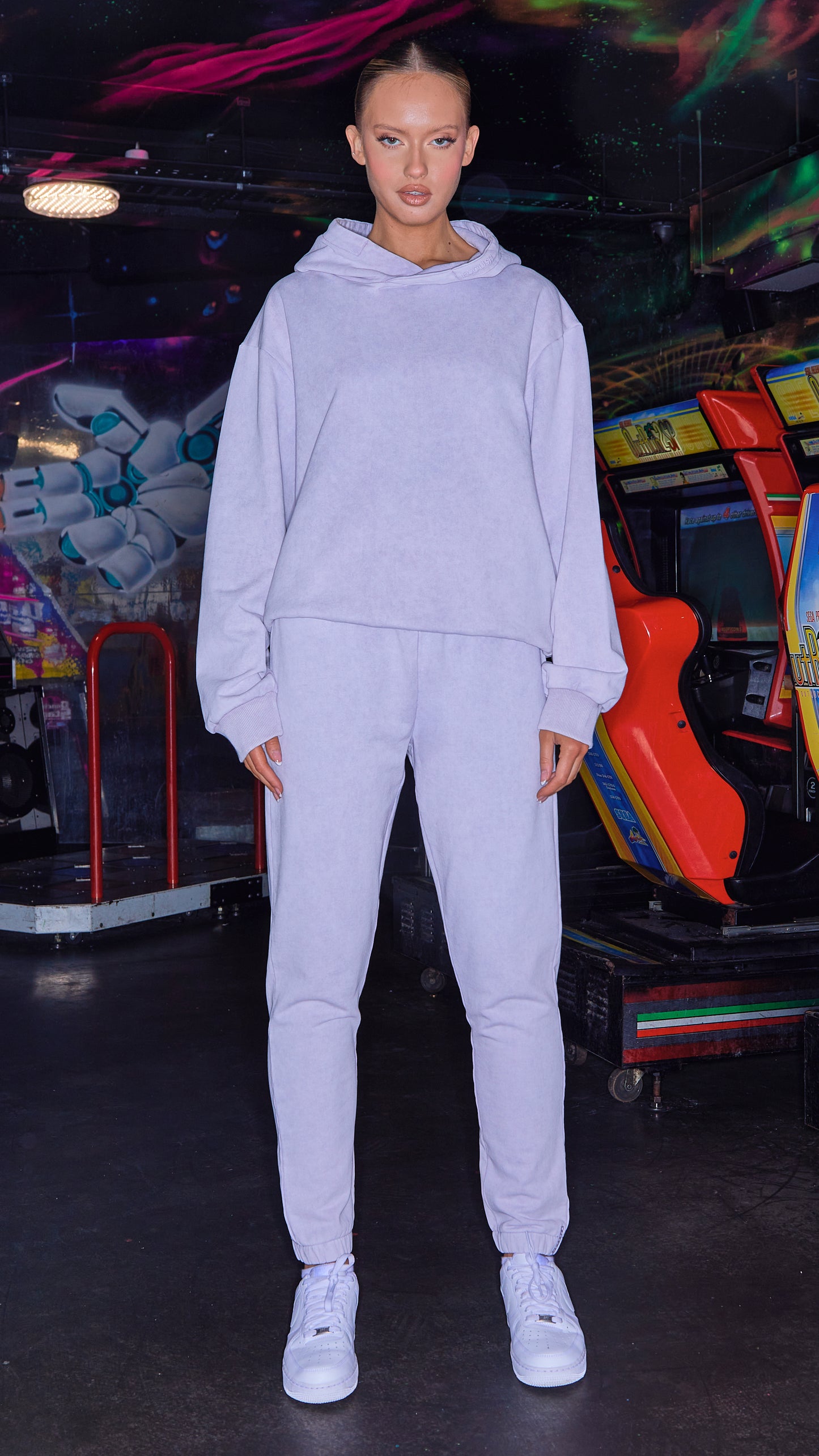 full shot of womens luxury tracksuit in lilac