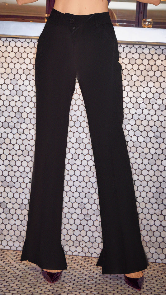 model wearing tailored black womens trousers