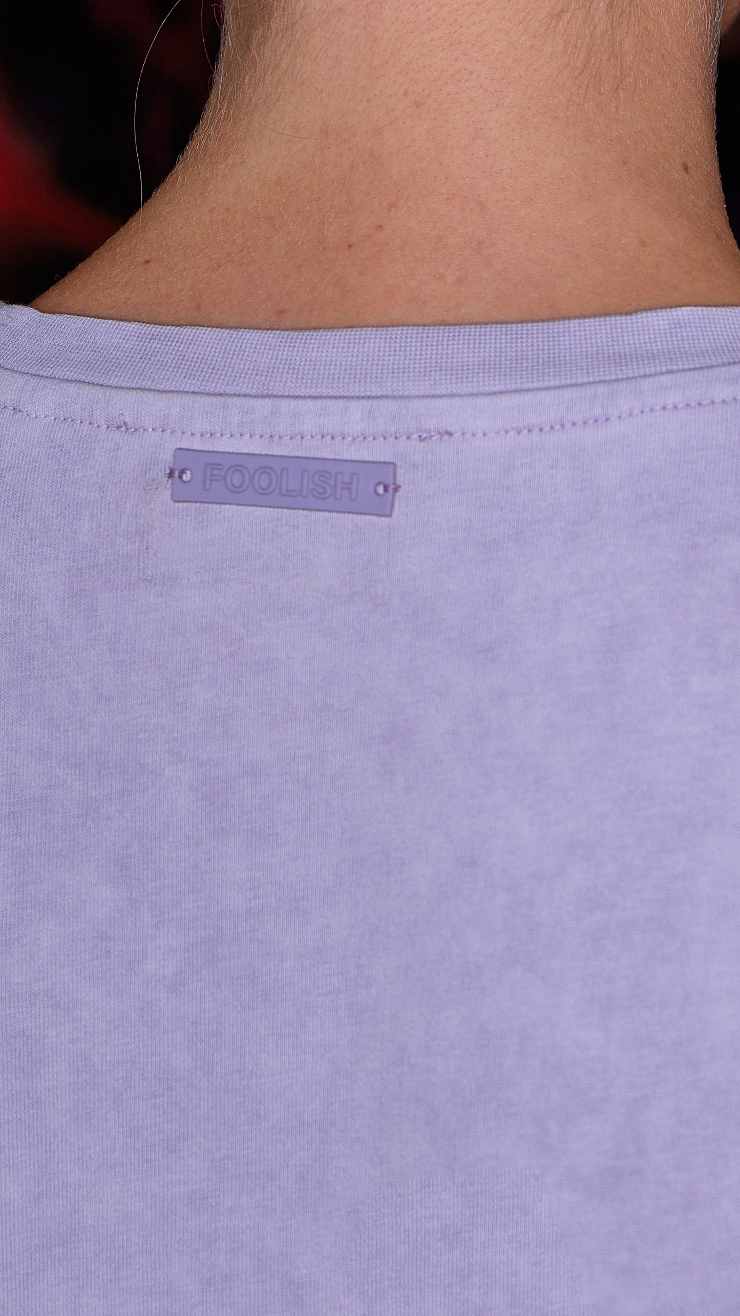 luxury detailing on back of womens rustic t-shirt in lilac