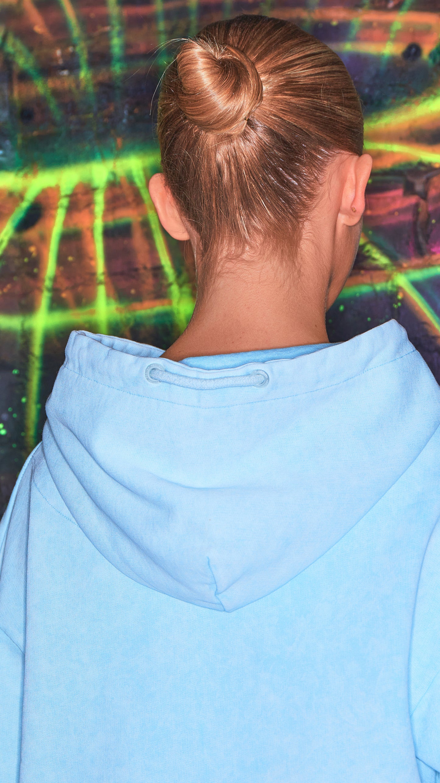 view of hood on womens luxury chalk blue hoodie