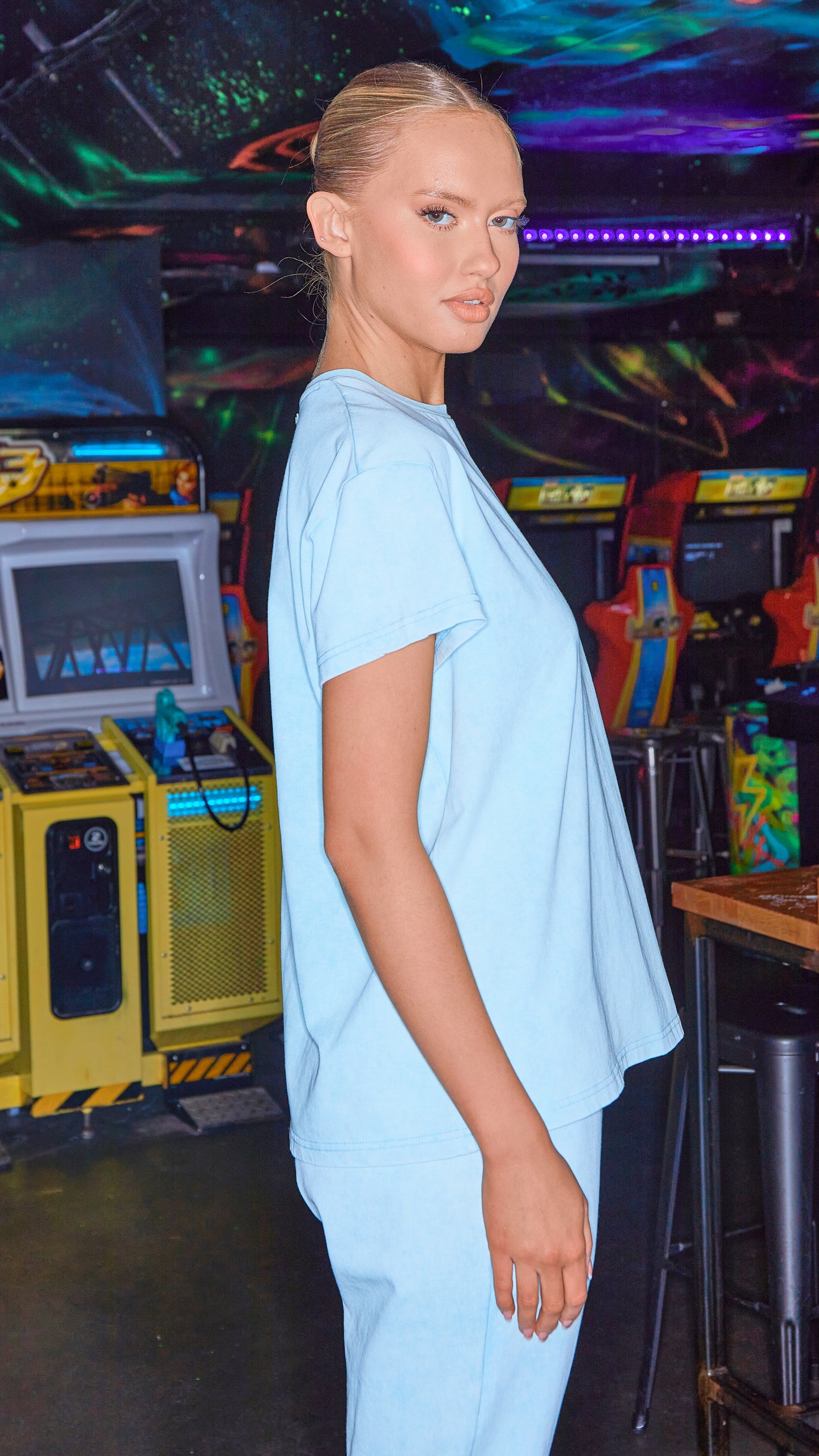 side view of womens luxury t-shirt and joggers in chalk blue
