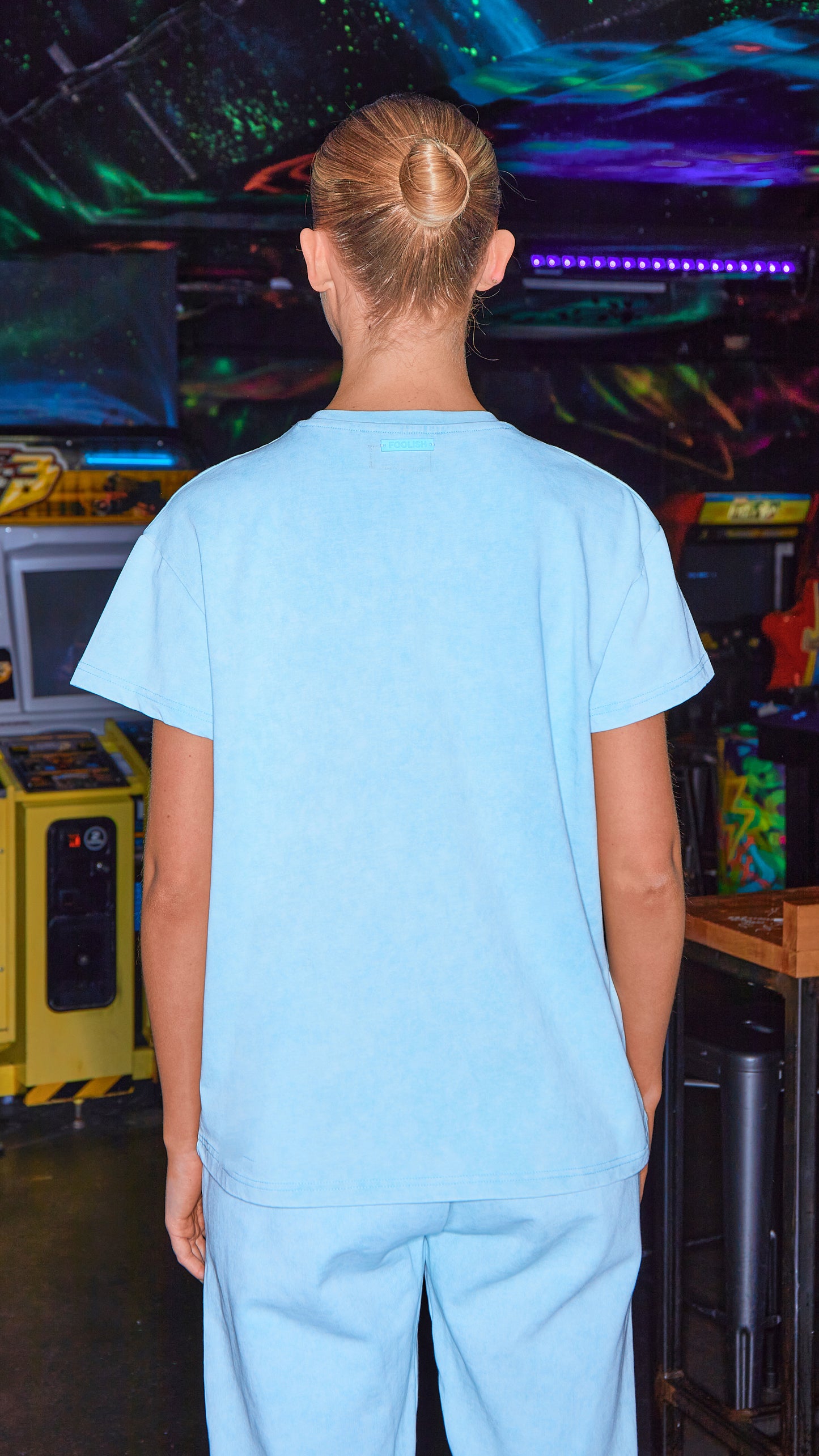back view of luxury womens t-shirt in chalk blue