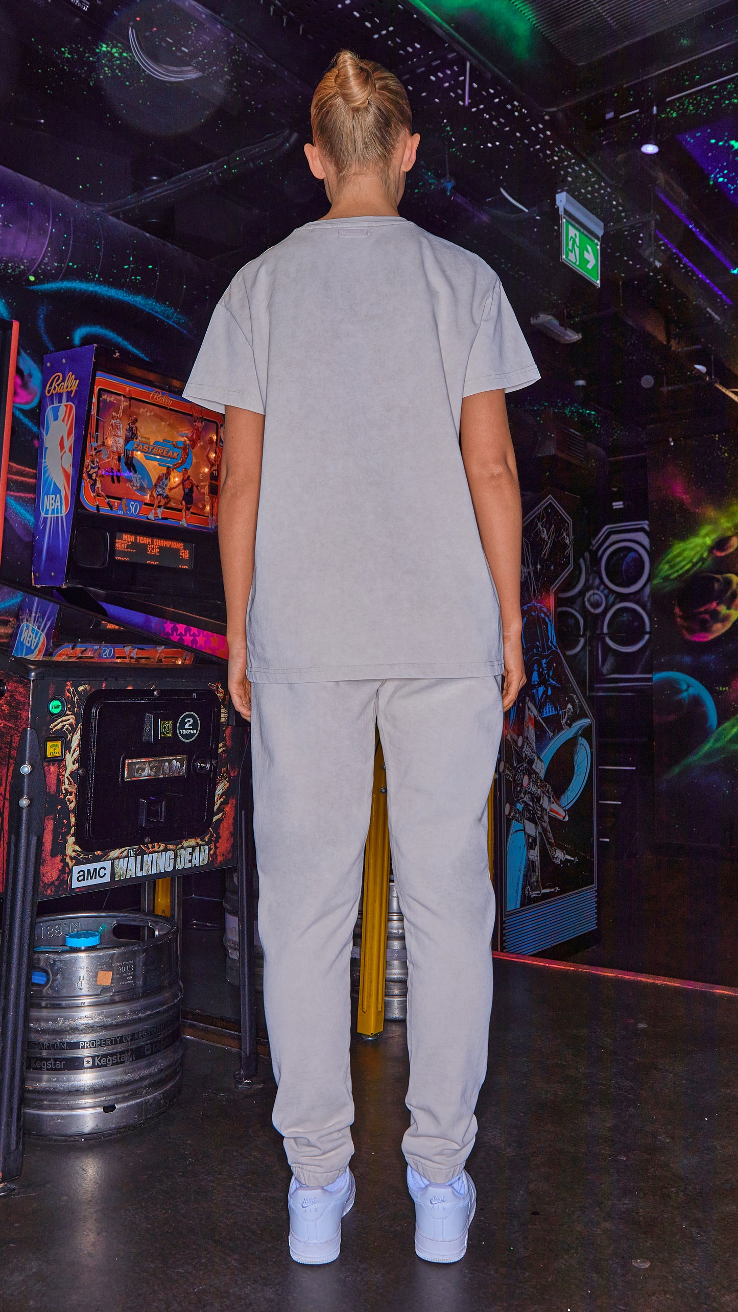 back view of luxury womens t-shirt and joggers in stone