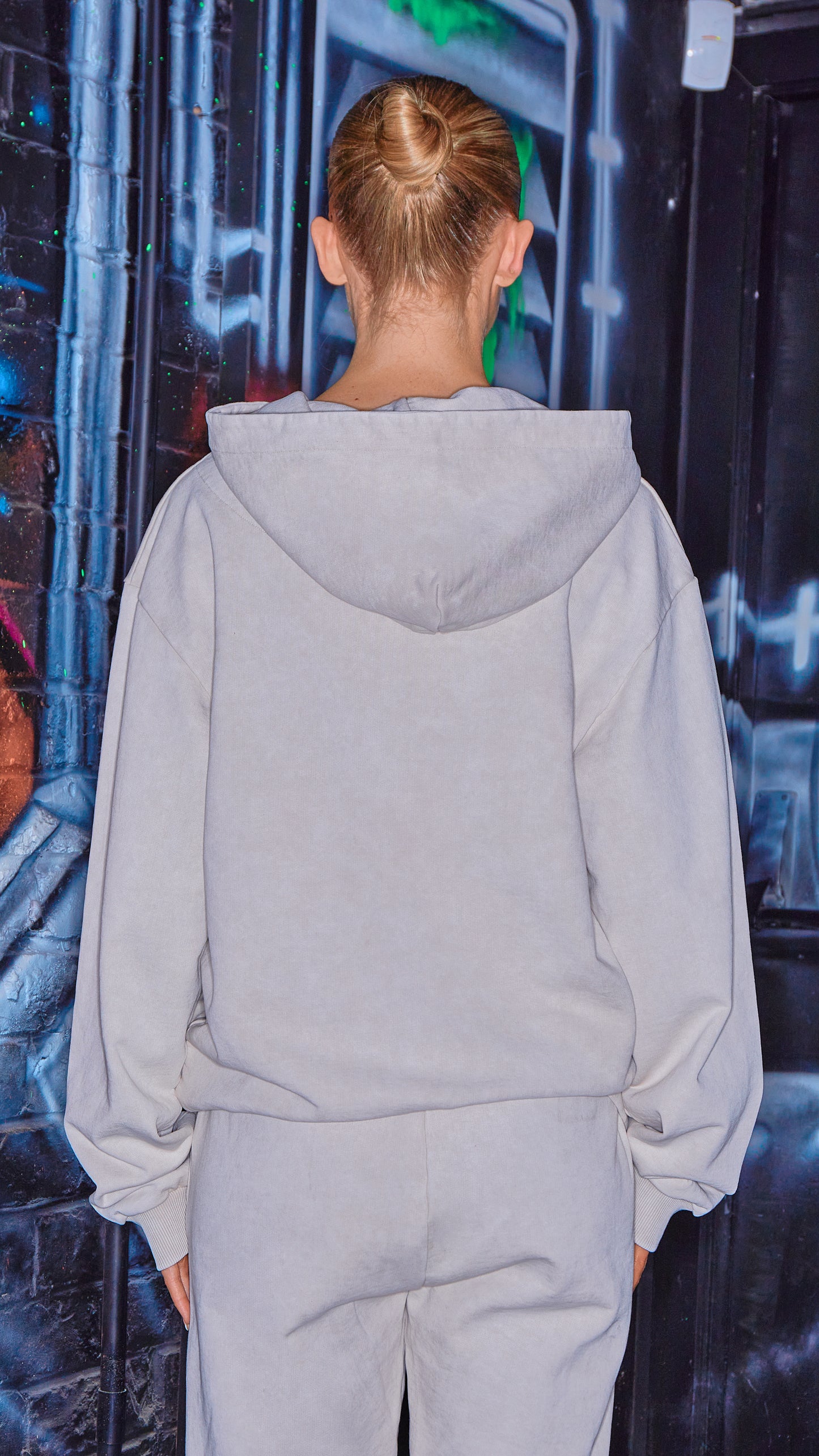 back view to show hood on womens luxury hoodie in stone