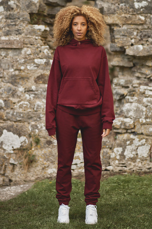 full front view of luxury womens tracksuit in burgundy
