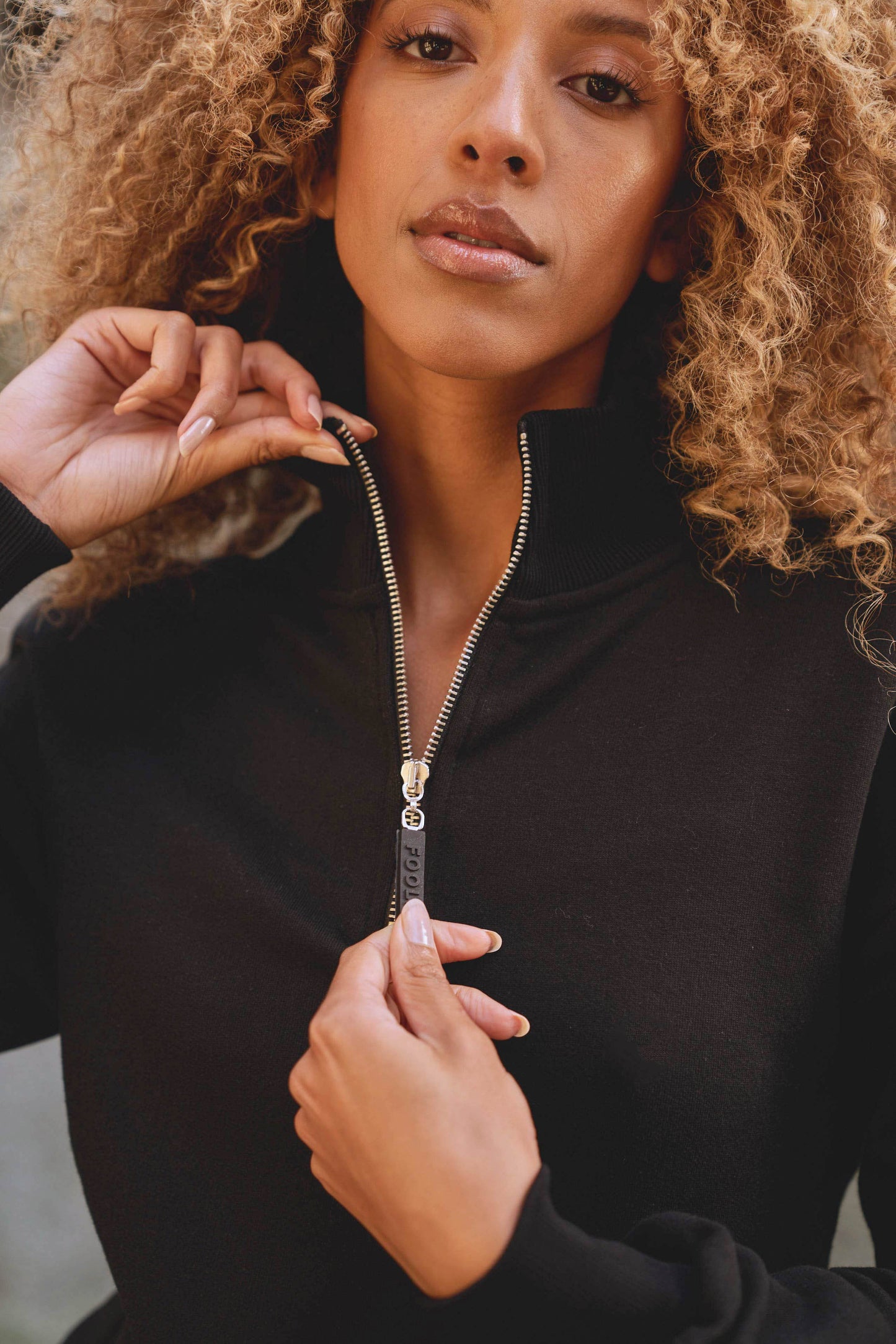 close up of luxury womens sweatshirt in black