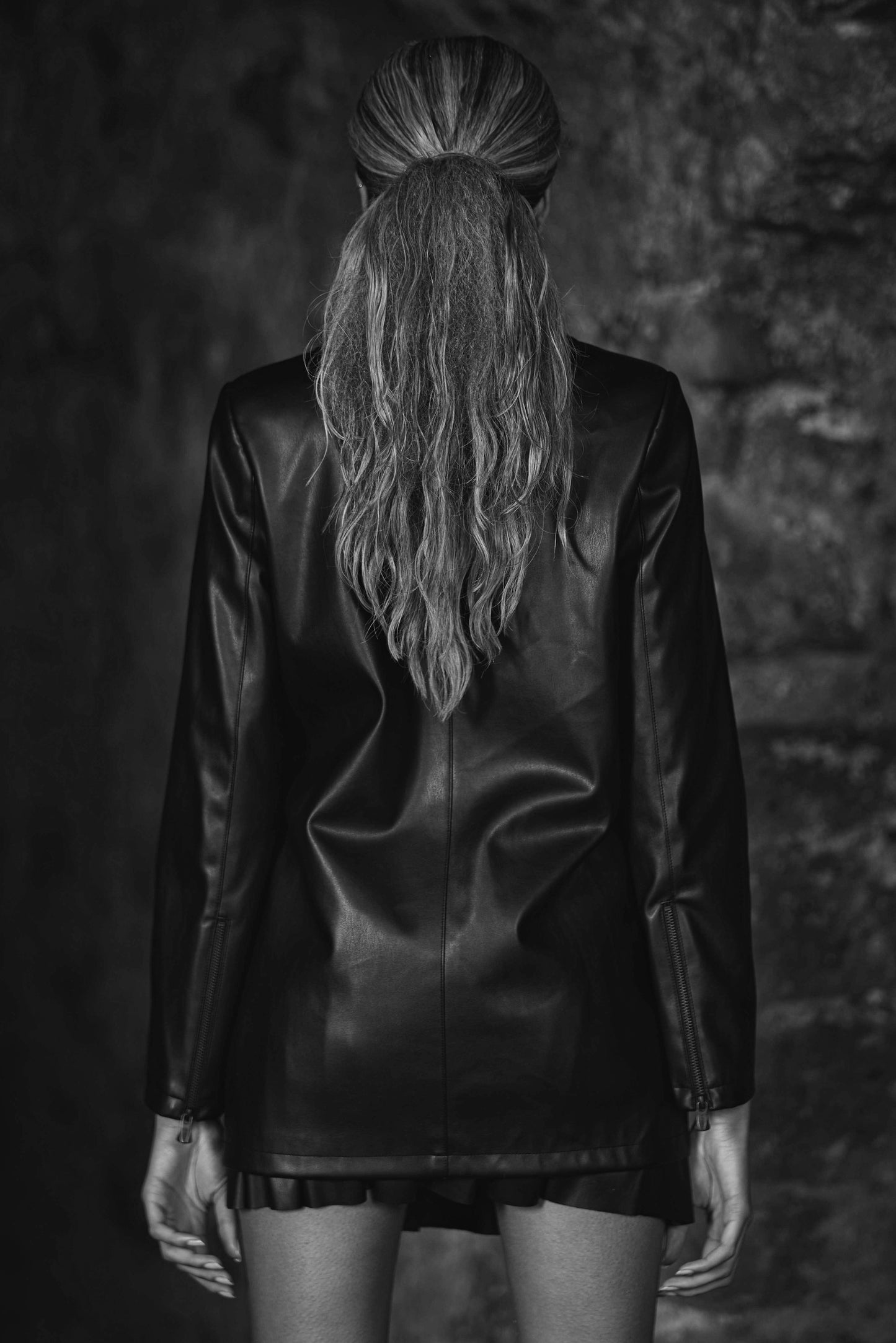 back view of luxury vegan leather blazer in black