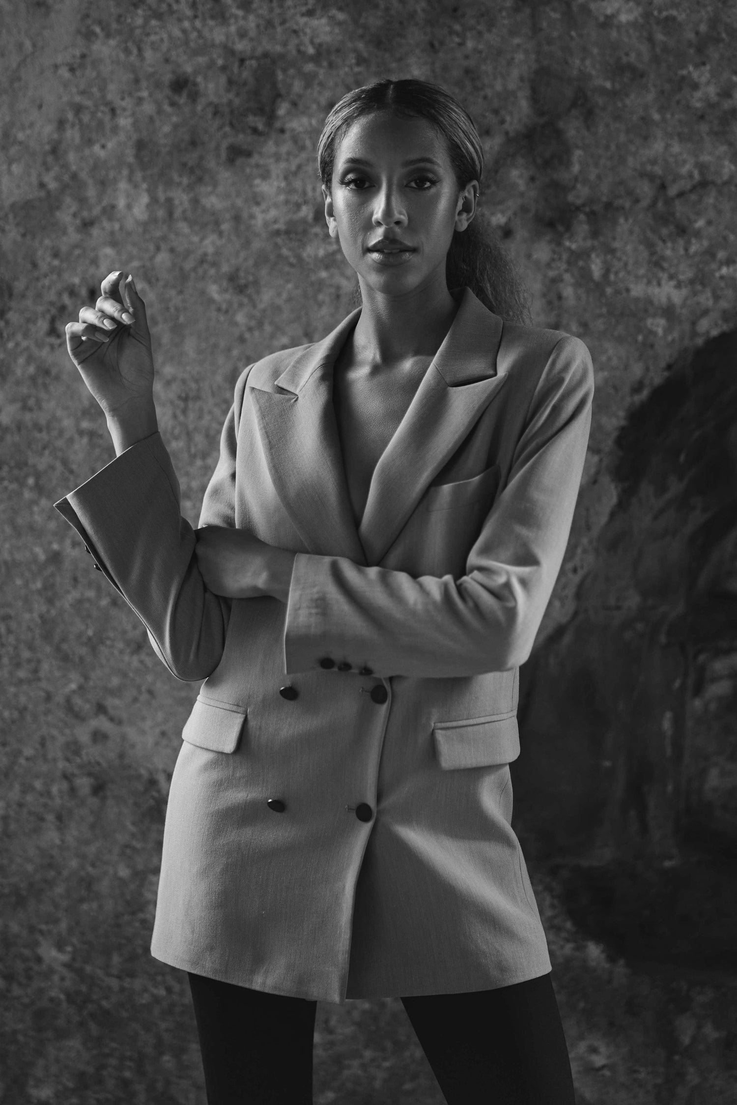 black and white image of womens luxury blazer in camel 