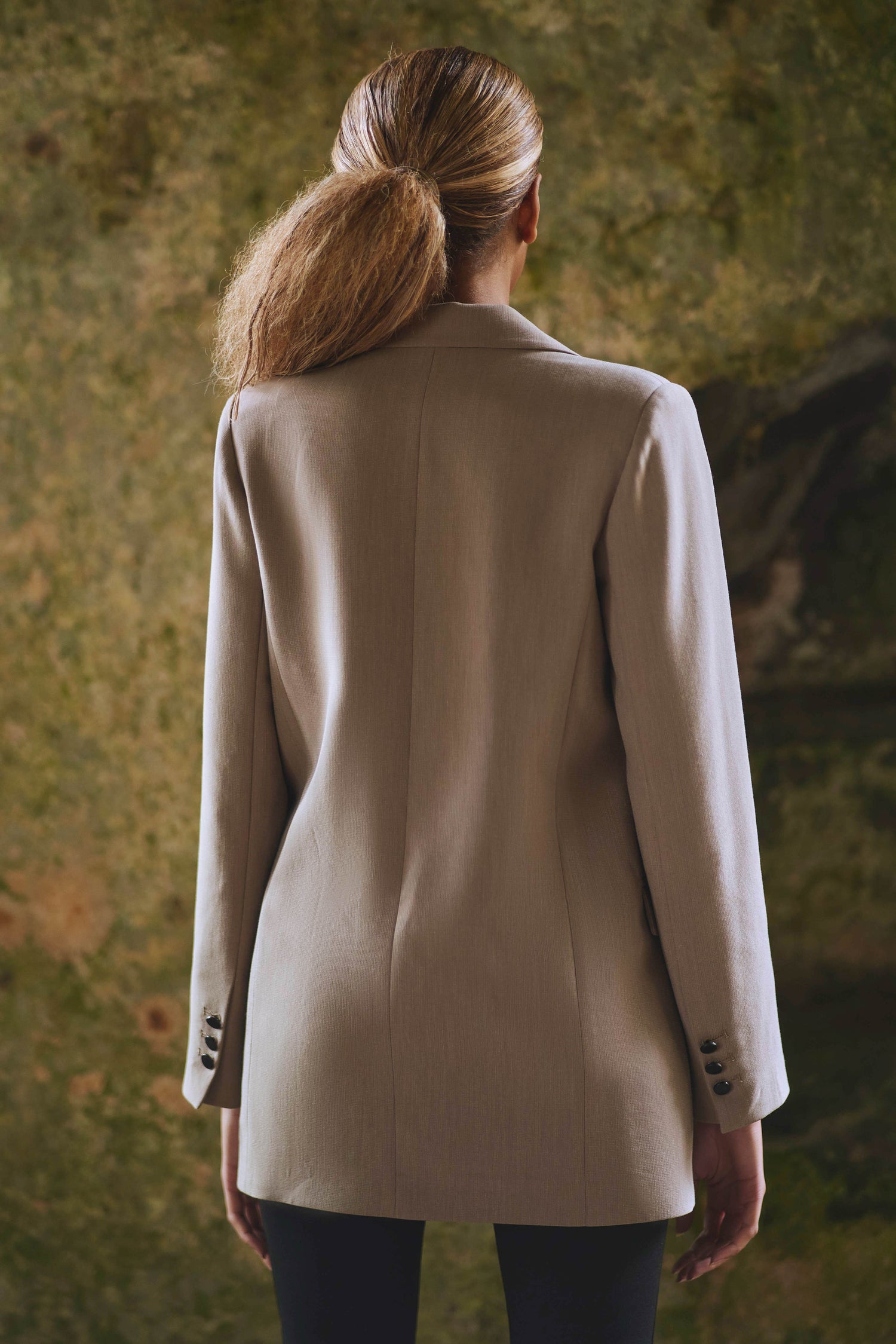 back view of womens double breasted blazer in camel
