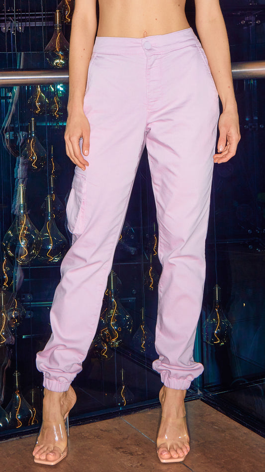 model wearing womens tailored joggers in pink with clear heels