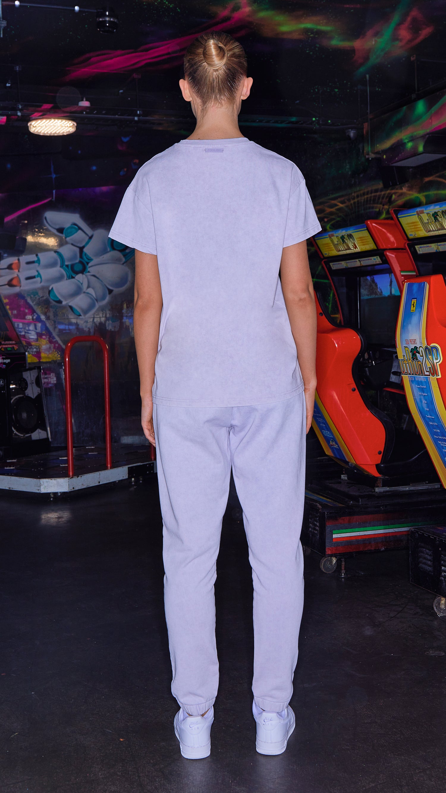 back view of luxury joggers and tshirt in lilac