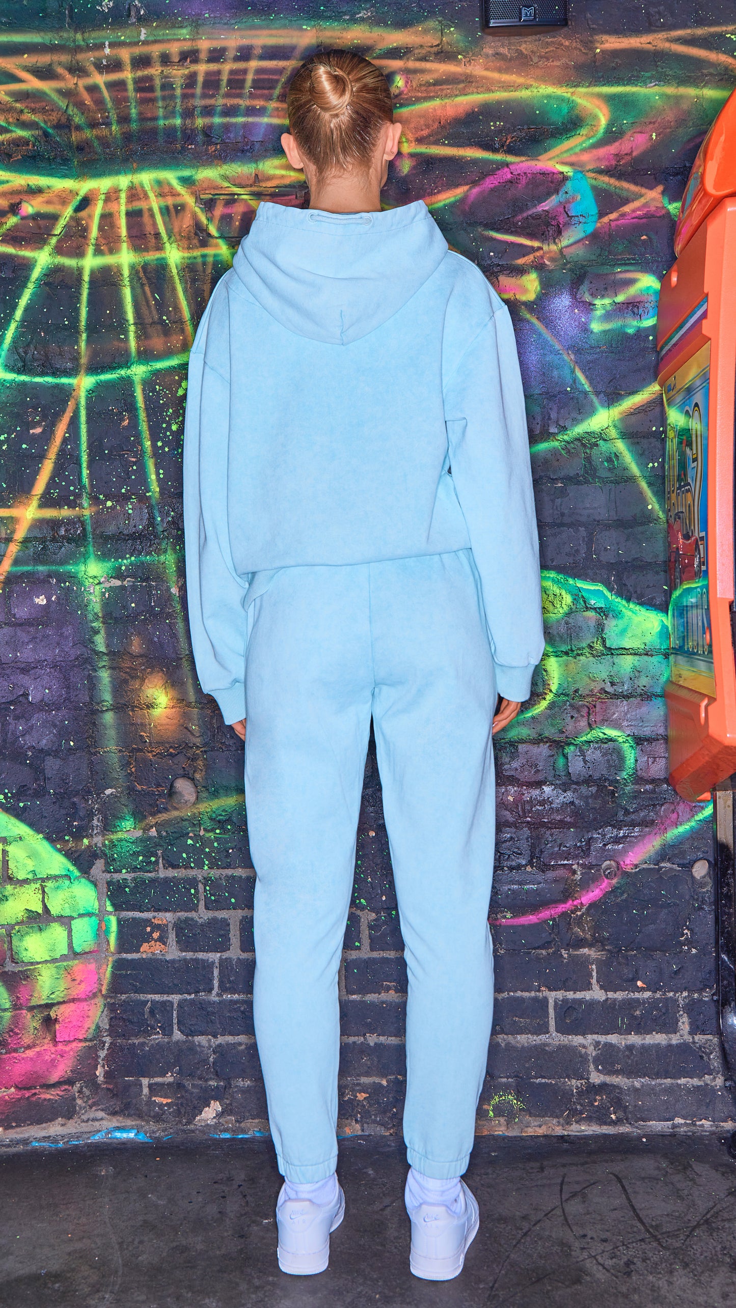 full back view of chalk blue womens luxury tracksuit