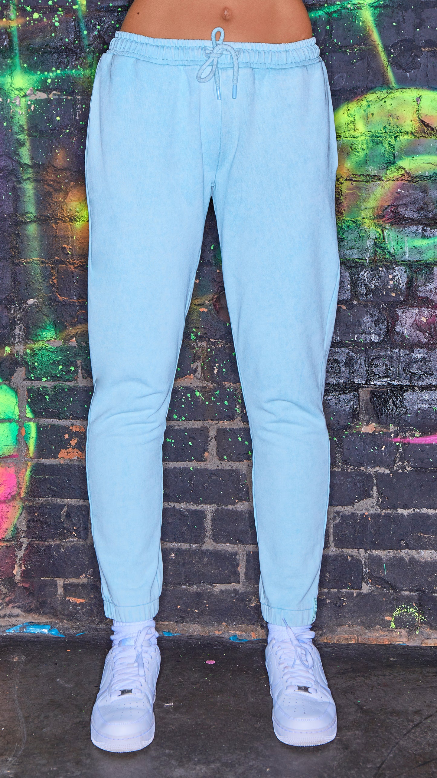 front view of womens luxury joggers in chalk blue