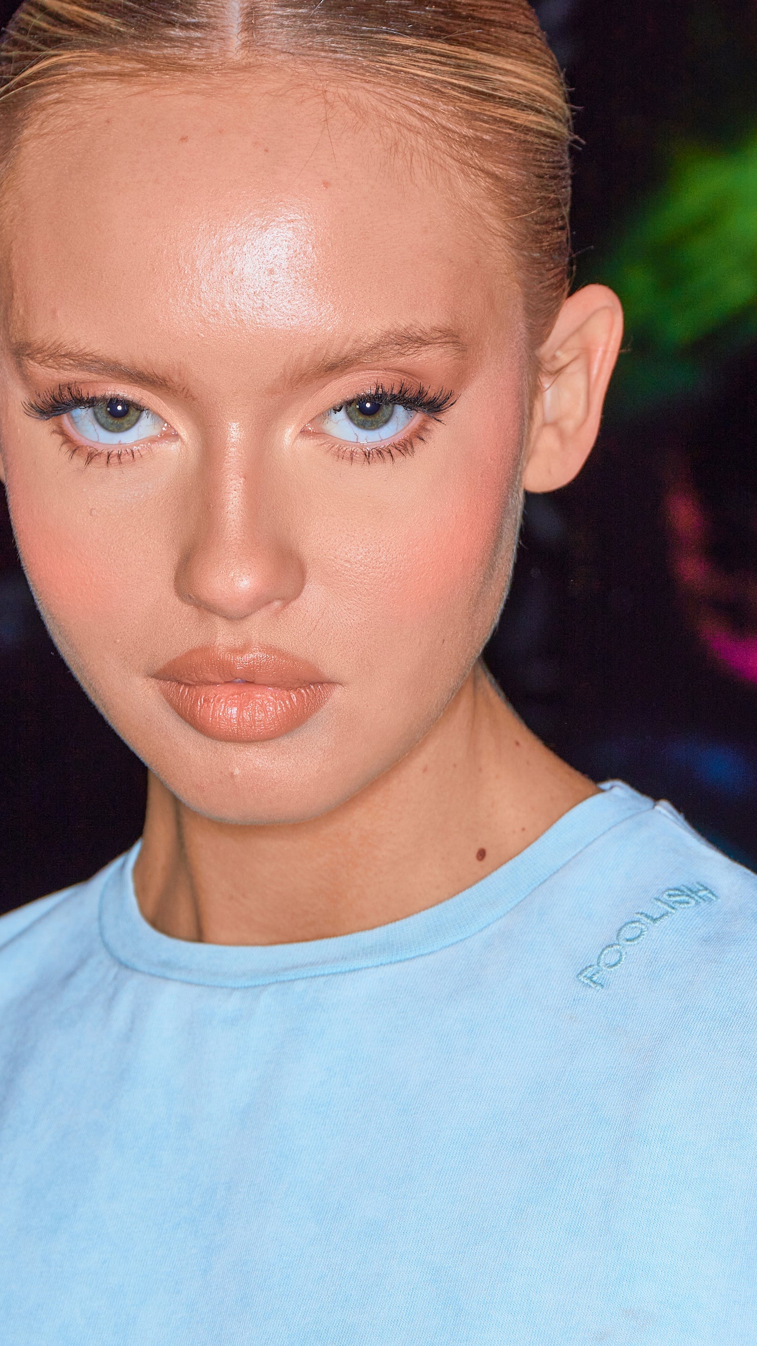 close up of shoulder detailing on organic womens t-shirt in chalk blue